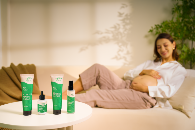 woman on lounge with natural botanicals maternity skincare range