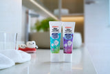 Pigeon baby toothgel toothpaste grape flavour and nautral flavour pictured on baby's bathroom counter