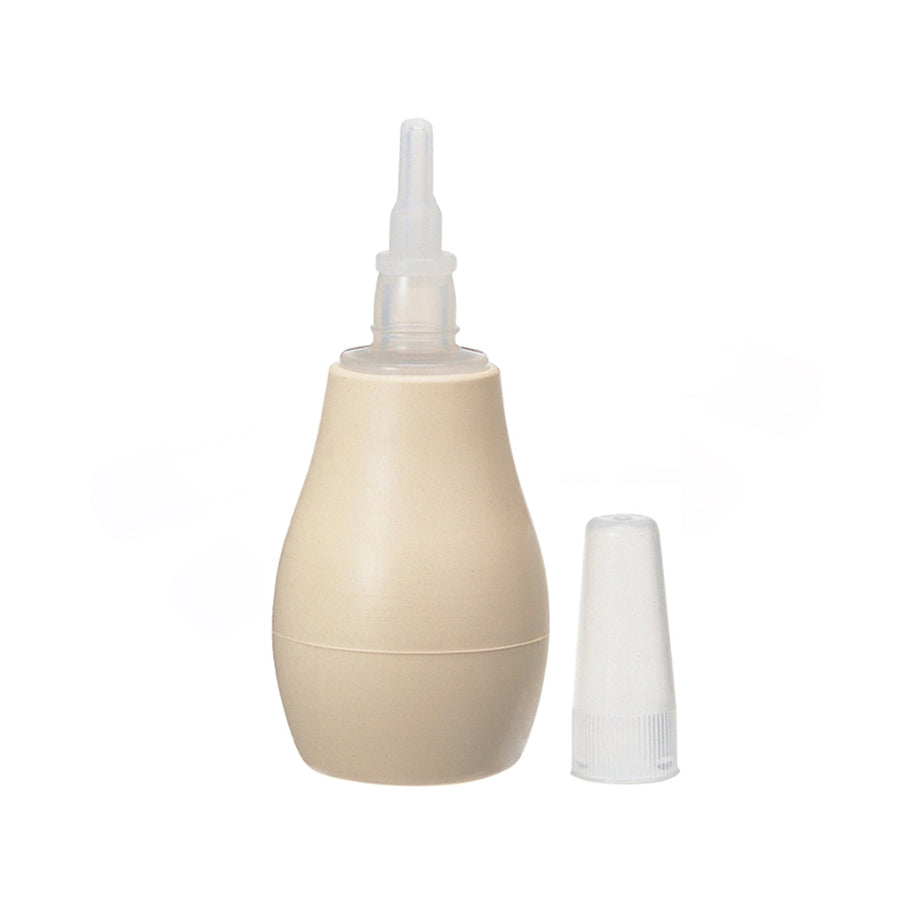 Pigeon nose cleaner with the nozzle cap next to it