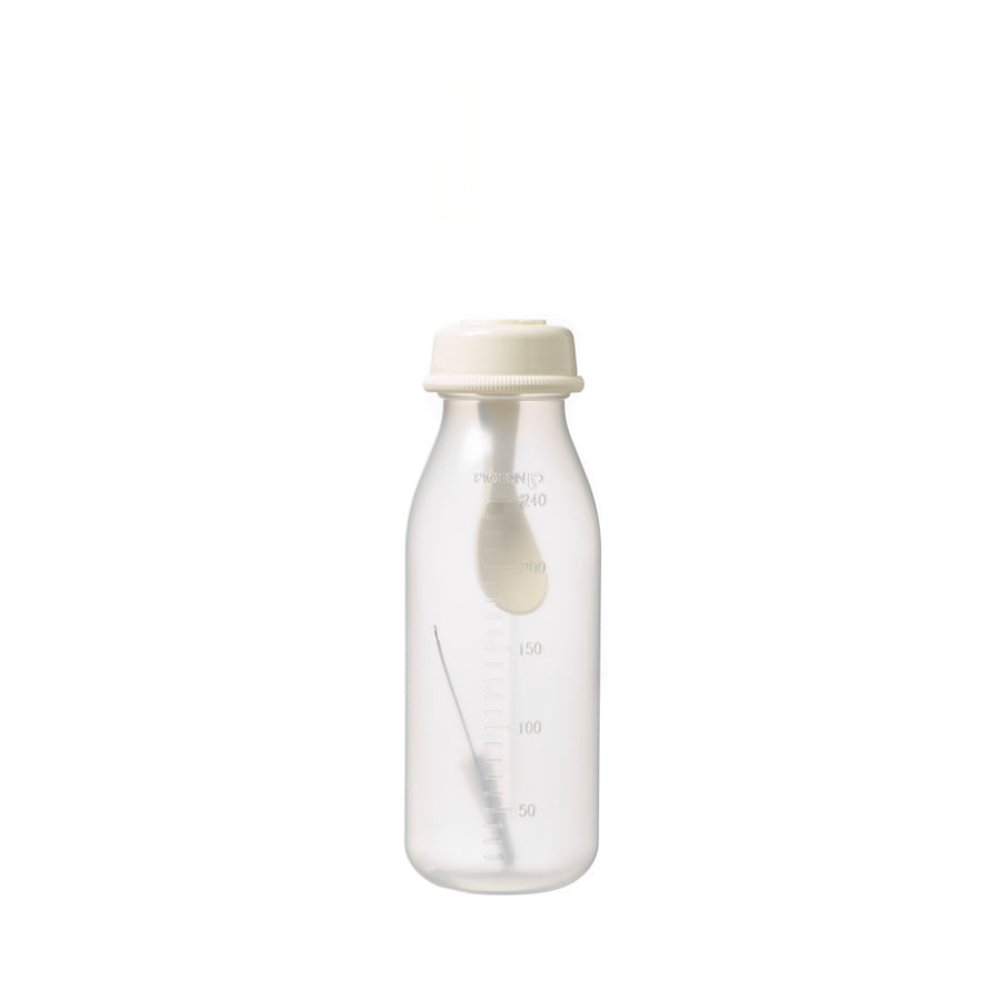 a 240mL pigeon weaning bottle with spoon in the bottle